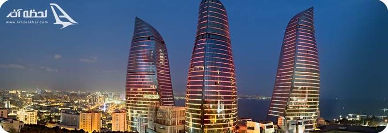 برج های شیشه ای شعله در شب