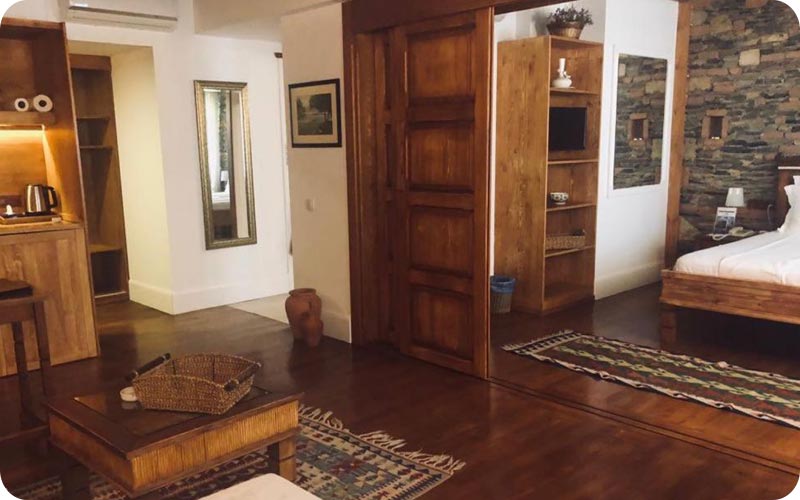 فضای اتاق خواب هتل ال وینو اند سوئیتز